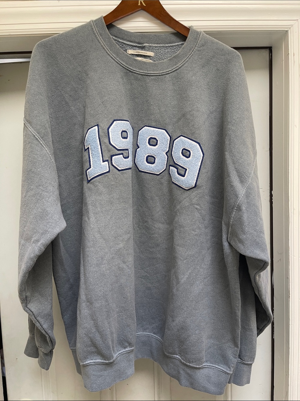 Anthropologie Blue-Gray Crewneck Sweatshirt with 1989 Appliqué
